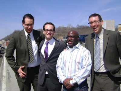 05 Eric Caine, 2nd from right, with Exoneration Project team members, L to R, Frank Bednarz, Elliot Slosar & Russell Ainsworth, LR.jpg