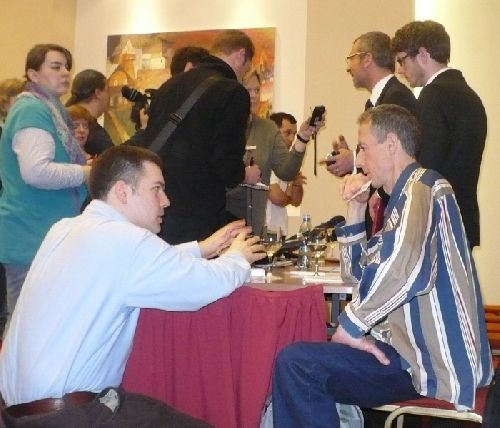 __Peter Tatchell, right, talks with reporter.jpg